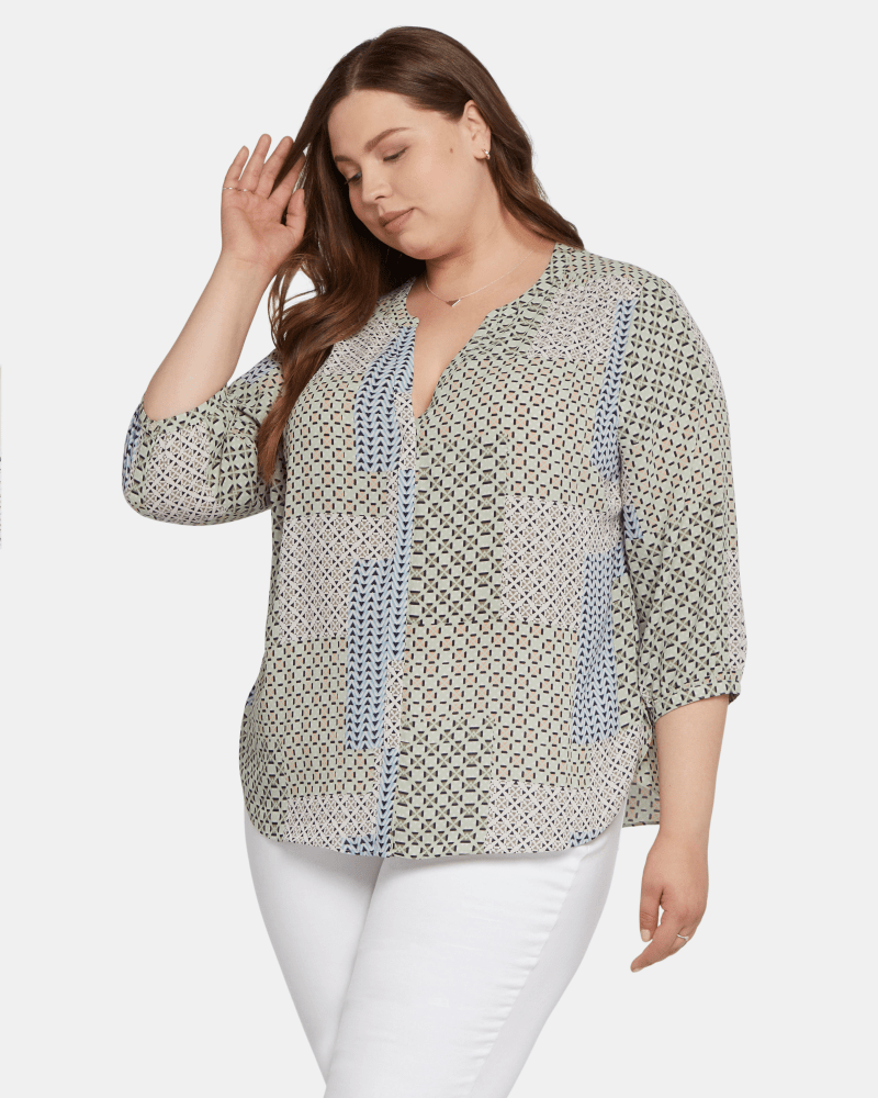 Front of a model wearing a size 0X Pintuck Blouse in Demuth Geo by NYDJ. | dia_product_style_image_id:200902